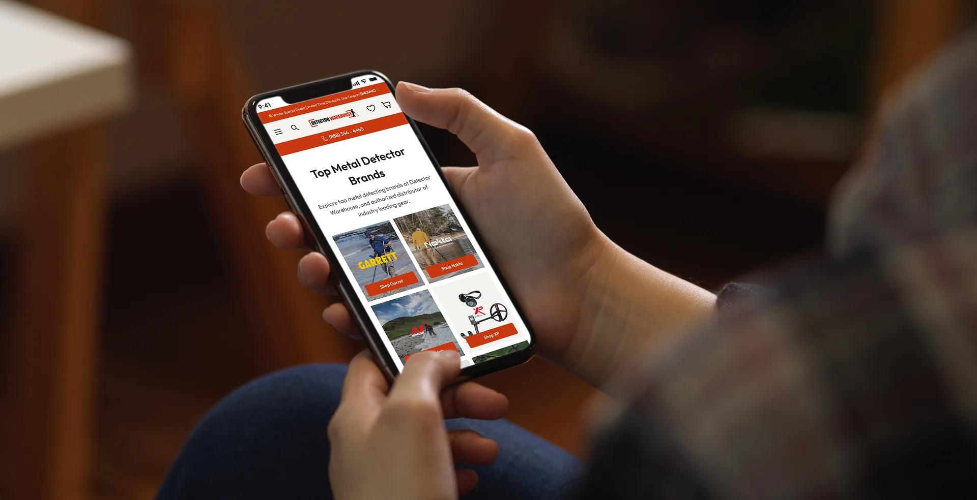 Detector Warehouse mobile storefront held in hand