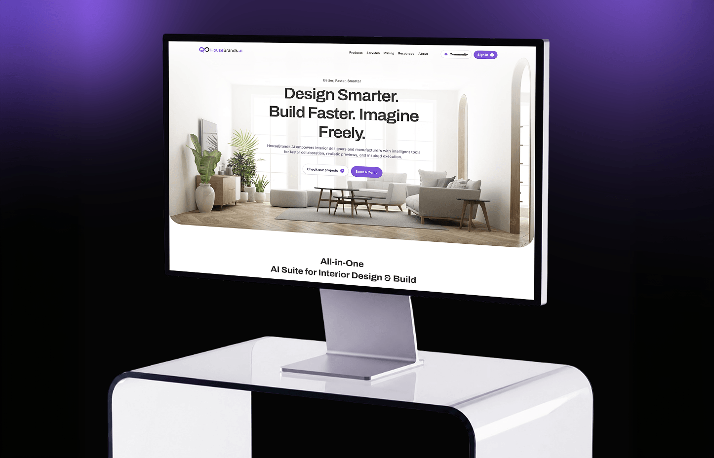 HouseBrands AI website shown on a monitor stand