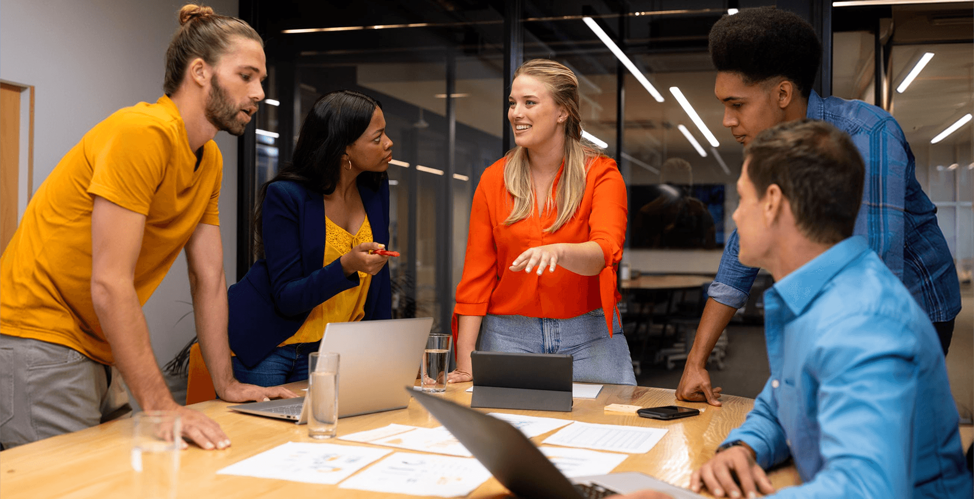 Project team discussing designs in a meeting
