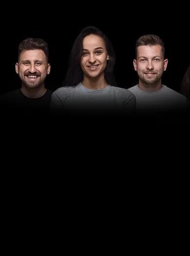 Three people smiling side by side against a black background
